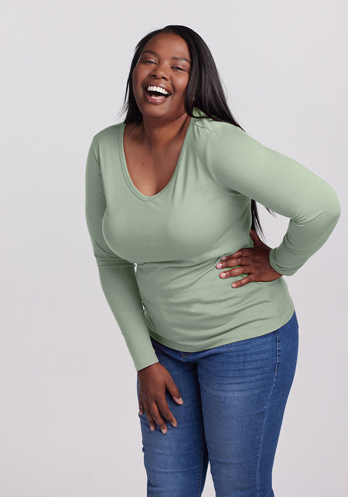 Model wearing Layla v neck - Basil | Le’Quita is 5’11”, wearing a size XL