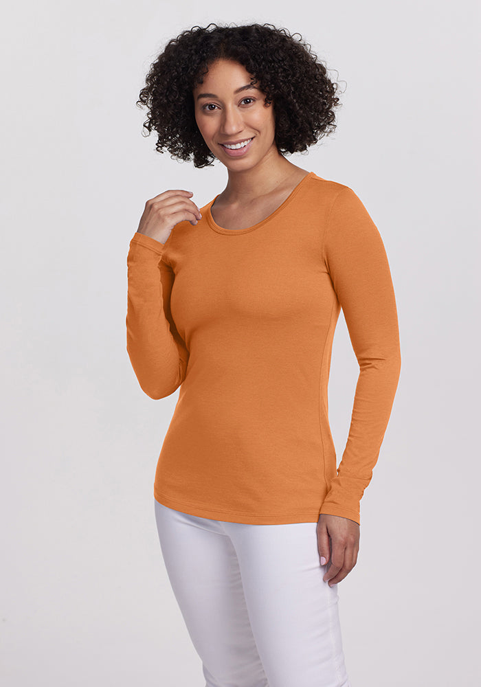 Model wearing Remi long sleeve - Coral Gold | Tori is 5'7", wearing a size S