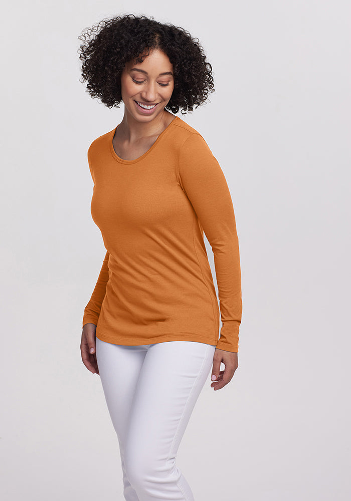 Model wearing Remi long sleeve - Coral Gold