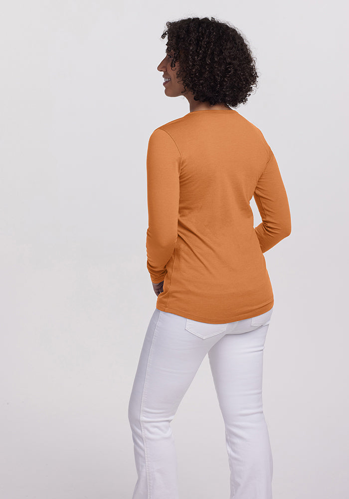 Model wearing Remi long sleeve - Coral Gold