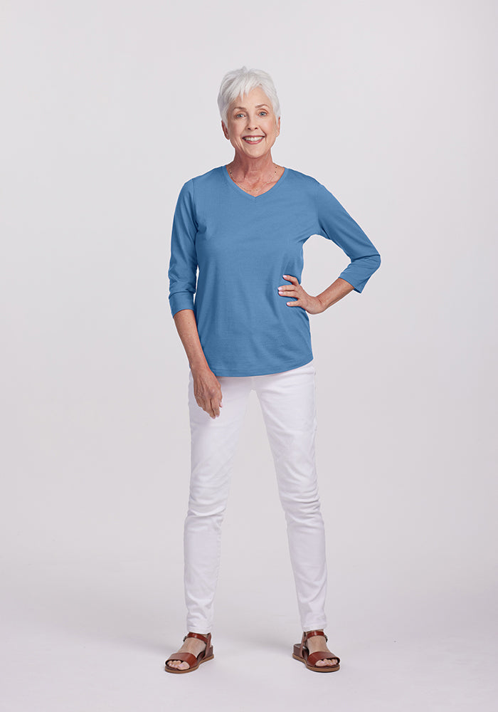 Model wearing Elena v neck - Coronet Blue | Kathy is 5’9”, wearing a size S