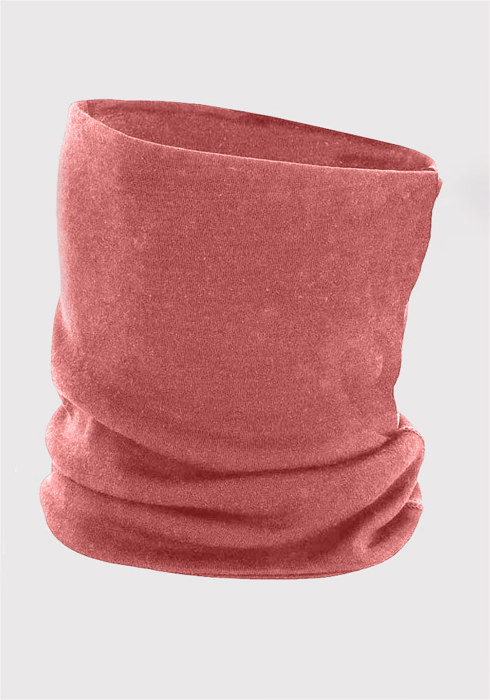 A dusty rose-colored Neck Gaiter by Woolx is displayed against a white background. This gaiter, perfect for outdoor activities, is made of soft, stretchy Merino wool, offering both casual comfort and functional style.