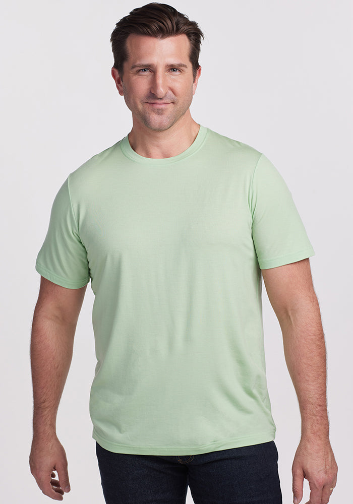 Model wearing Endurance tee - Quiet Green