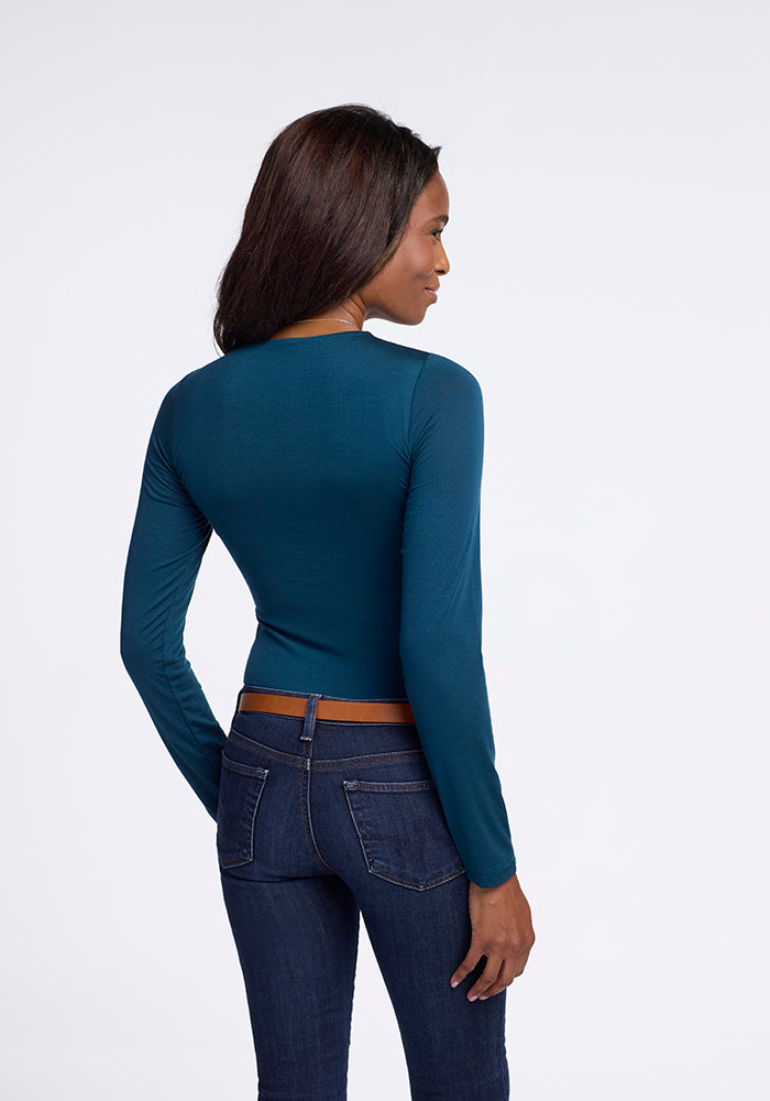 Model wearing Sophia bodysuit - Real Teal