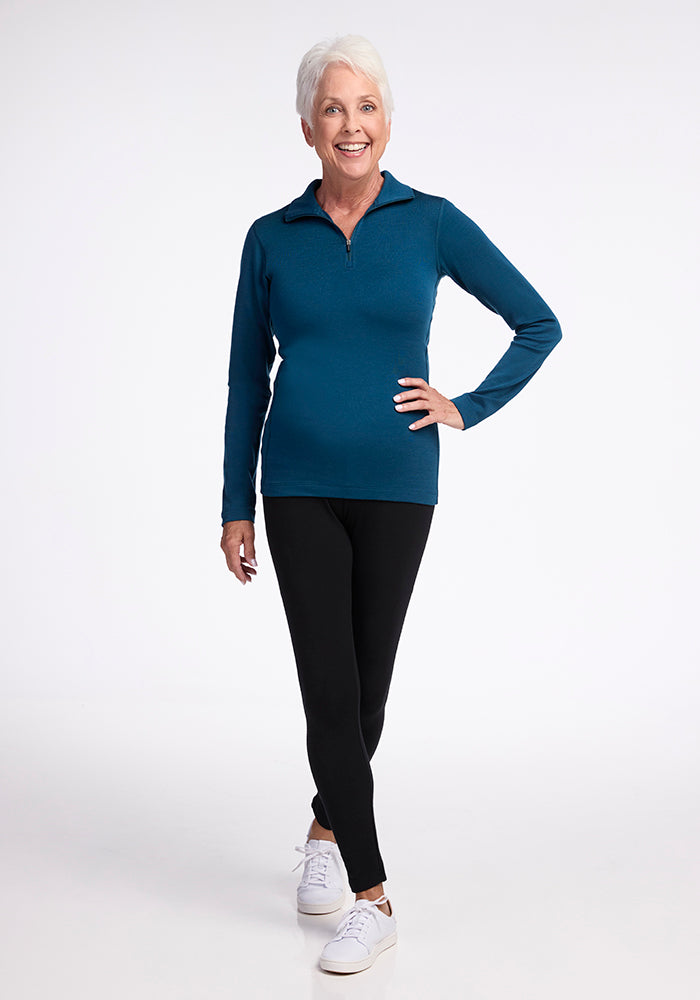 Model wearing Brooke 1/4 zip - Real Teal