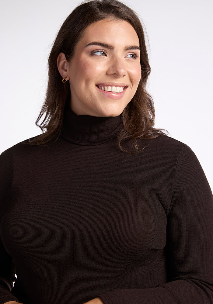 Model wearing Sage turtleneck - French Roast