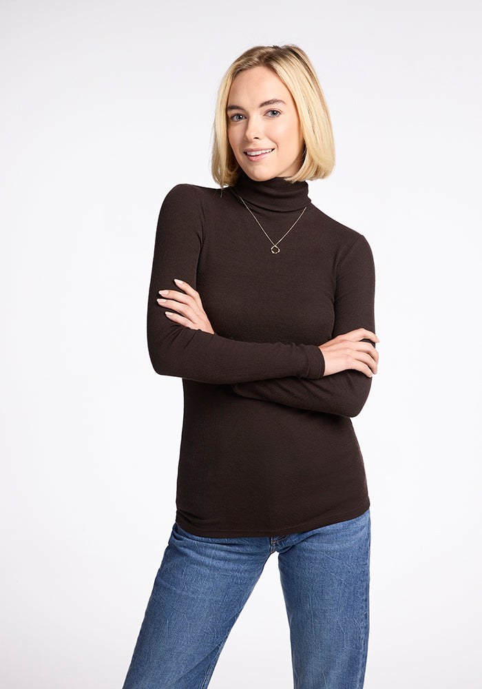 Model wearing Sage turtleneck - French Roast