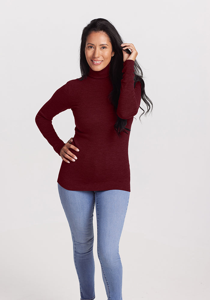 Model wearing Sage turtleneck - Cranberry Melange 