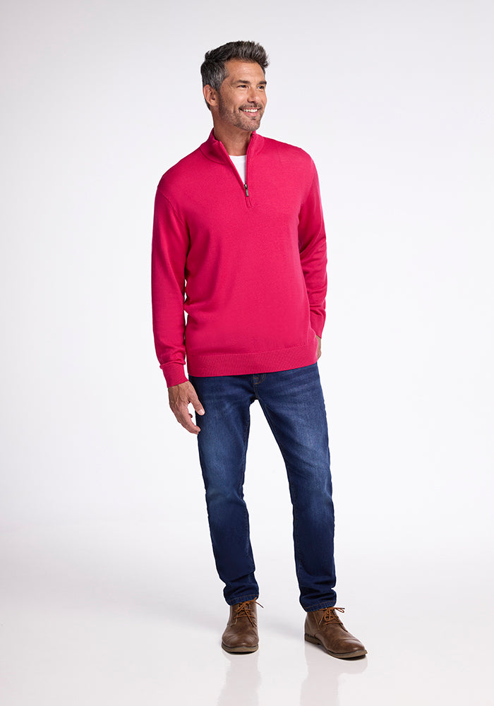 A man in the Woolx Enzo Quarter Zip - Berry Burst.