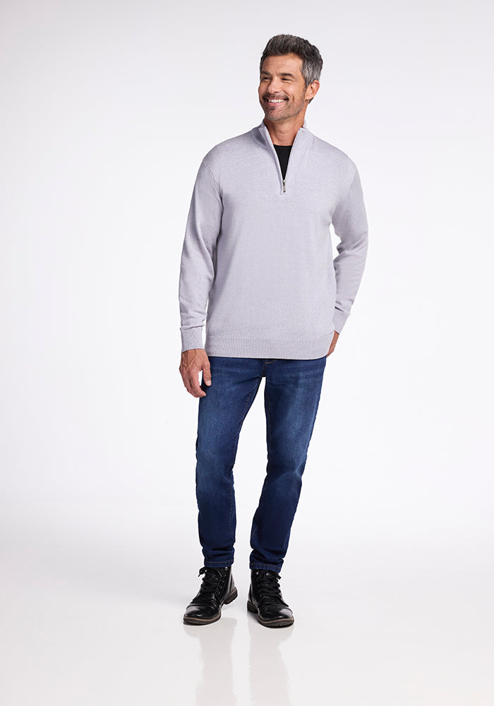 A man in the Enzo Quarter Zip - Mist by Woolx.