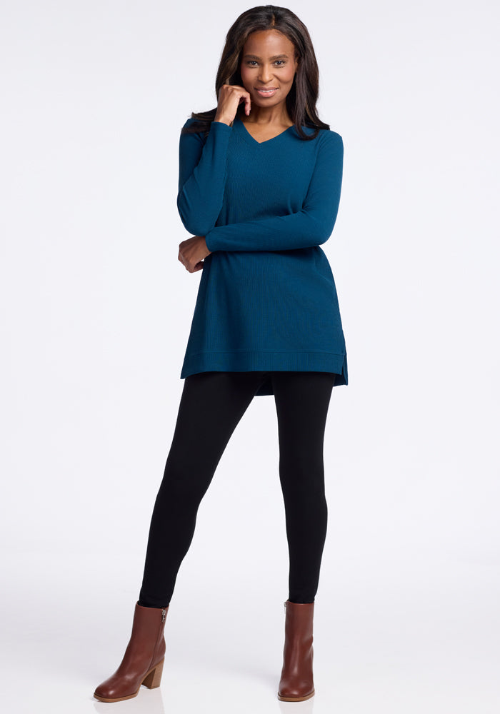 Model wearing real teal merino wool v neck sweater 