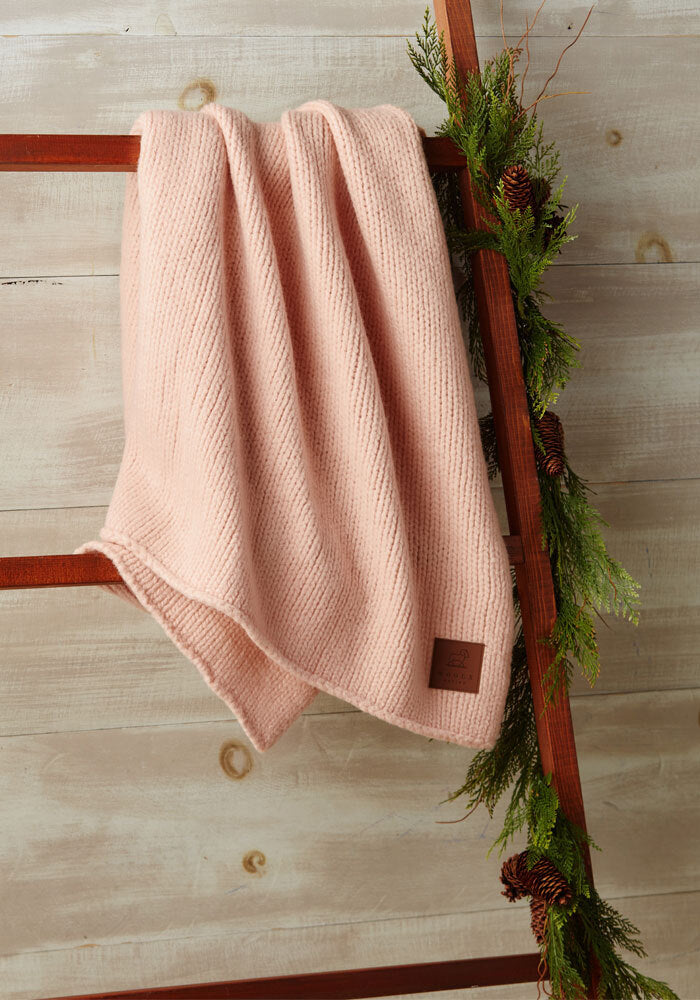 Saranac throw hanging on rack - Light Rose