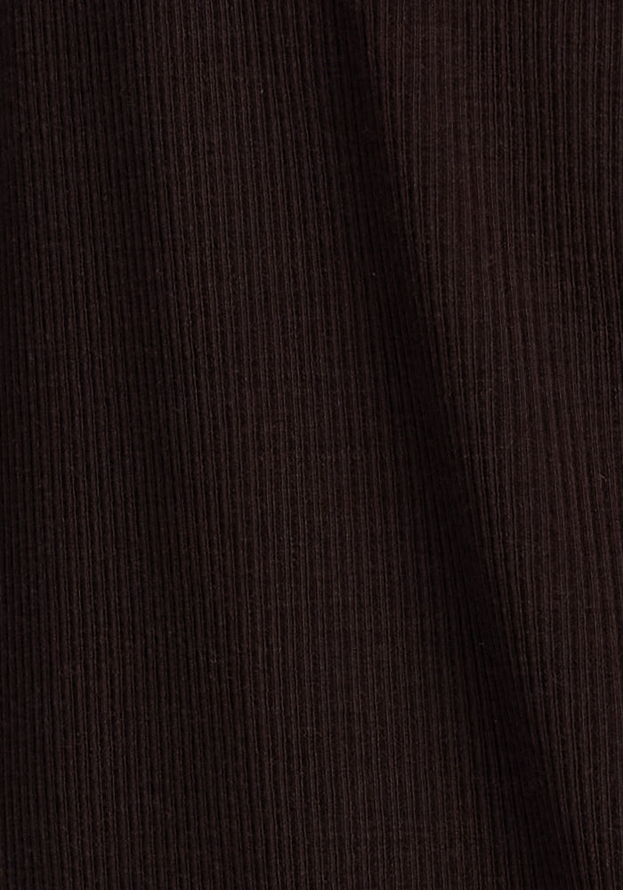 Close-up of the Evie Tunic - French Roast by Woolx, showcasing its brown ribbed fabric with a slightly diagonal pattern that highlights the texture and fine lines of the material.